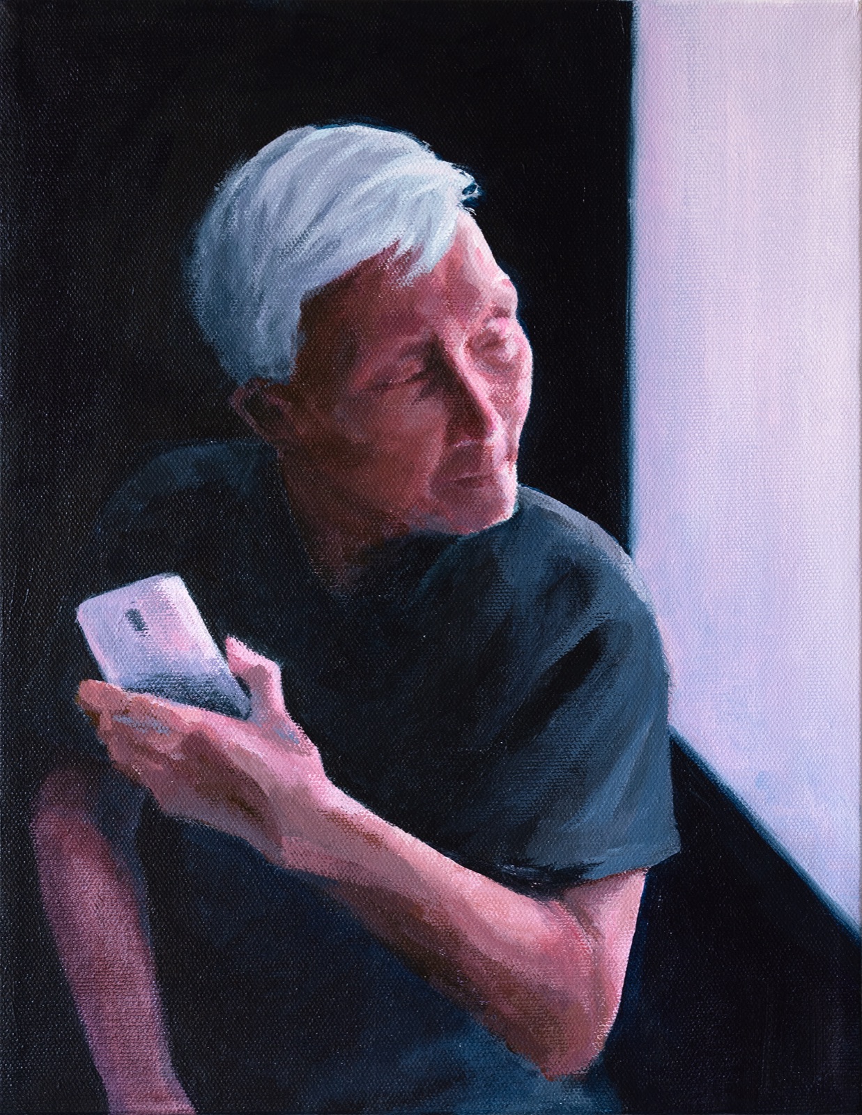 Portrait of the artist's grandfather holding a phone beside a bright window